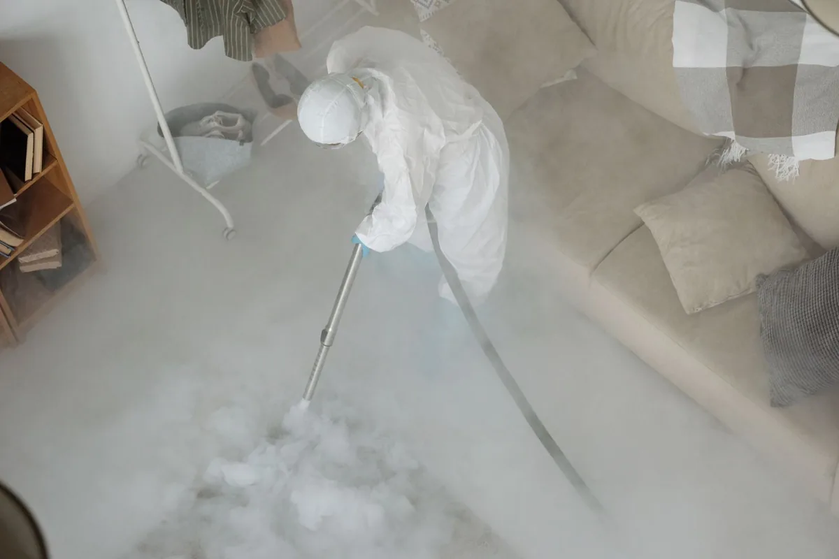 Biohazard cleanup technician in protective equipment, Winston Park, St. Petersburg, FL